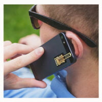 a man holding a cell phone to his ear