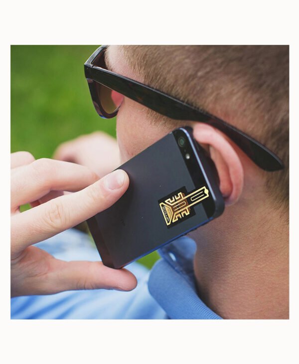 a man holding a cell phone to his ear