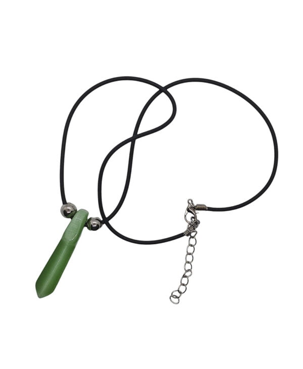 a necklace with a green point